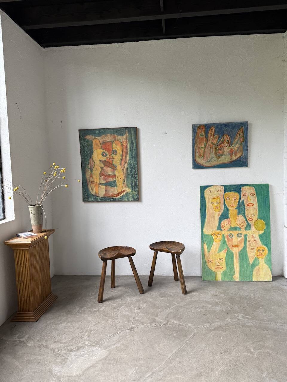 Pair of Le Selou tripod shepherd's stools