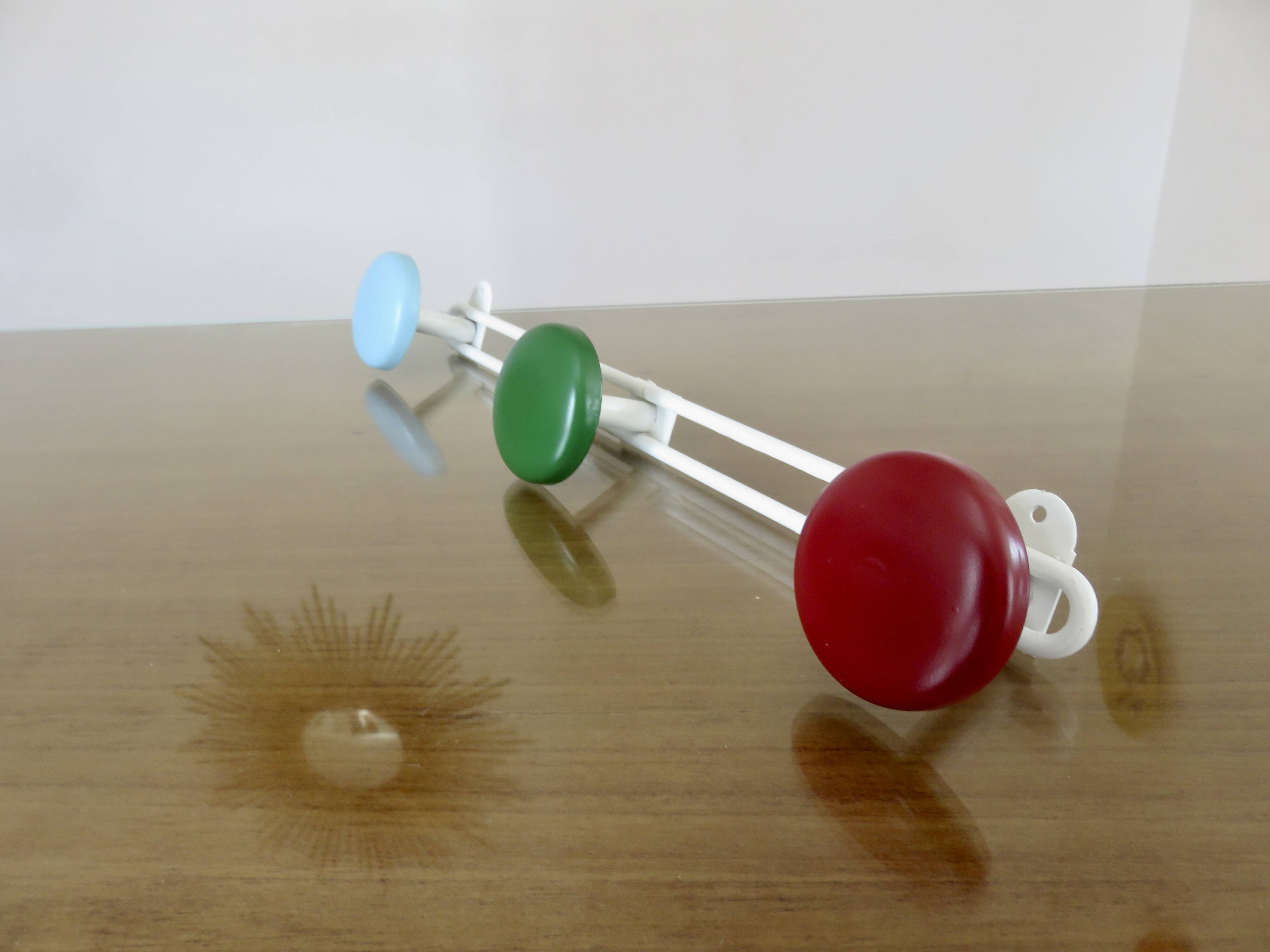 Metal coat rack, 3 colored hooks from the 60s and 70s