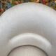 Old toad armchair in beige velvet