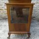 Rolling bar cabinet in walnut