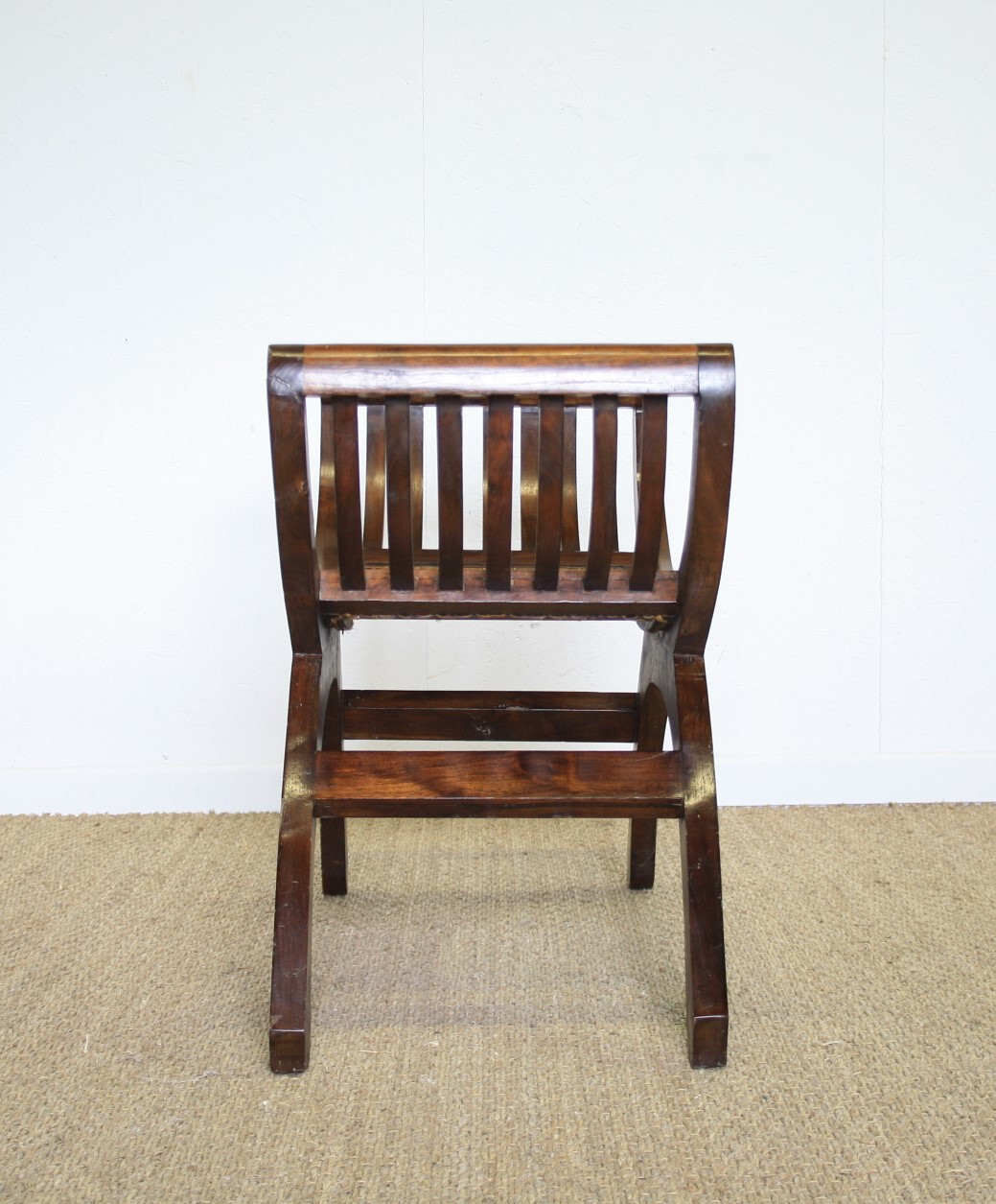 Wooden curule chair and canning