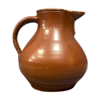 Old pottery water or wine jug from the 19th century
