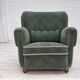 Fauteuil danois des années 1960, en laine de mobilier vert clair, avec des pieds en bois de chêne.