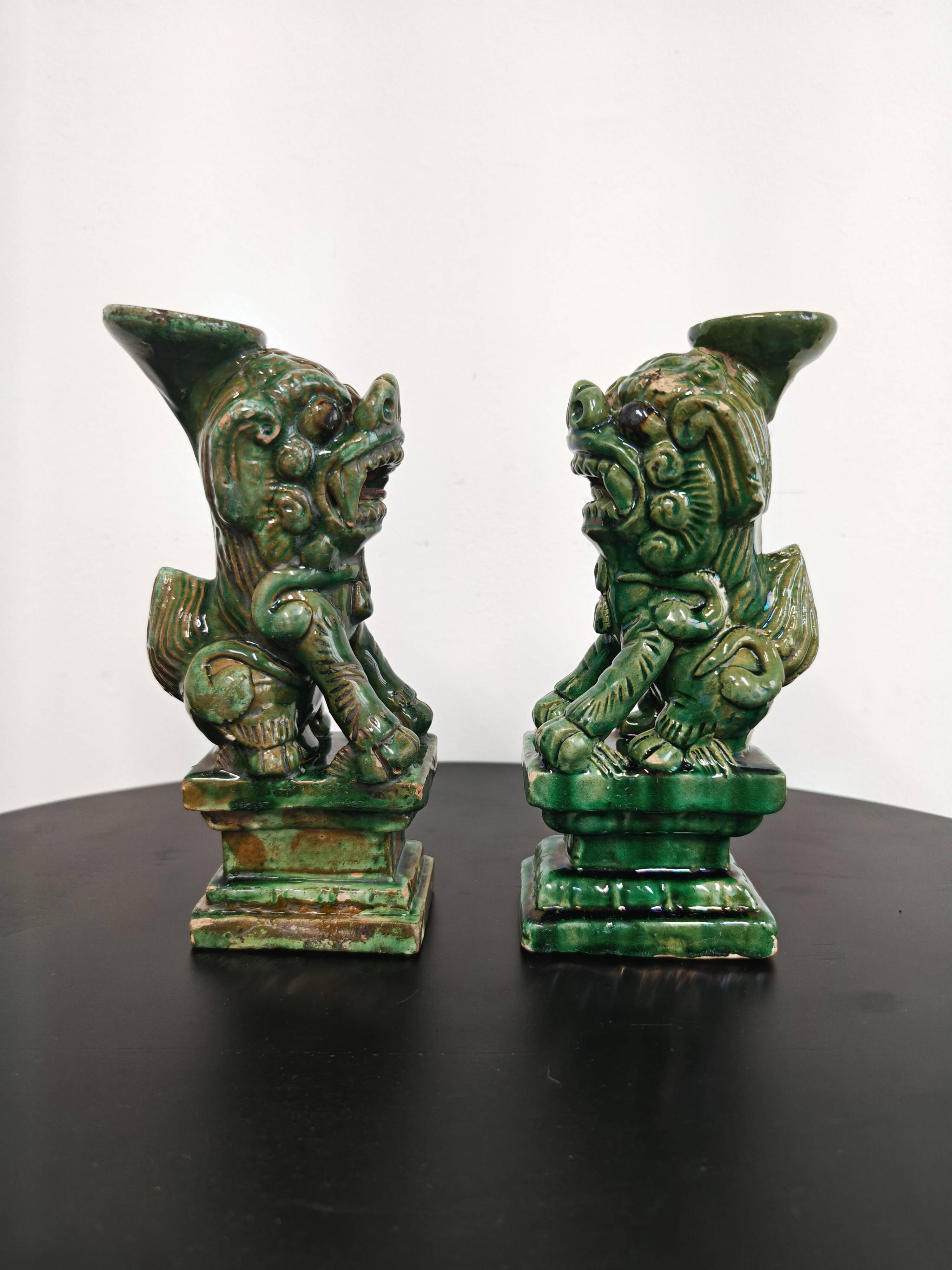 Pair of Foo Dog candle holders in ceramic, China 19th century