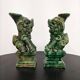 Pair of Foo Dog candle holders in ceramic, China 19th century