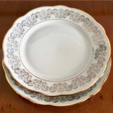 8 white and gold porcelain dessert plates