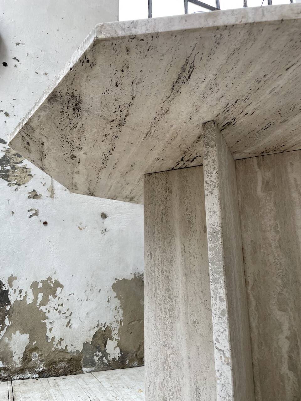 Octagonal travertine coffee table