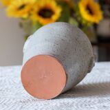 Old foam-glazed terracotta vase