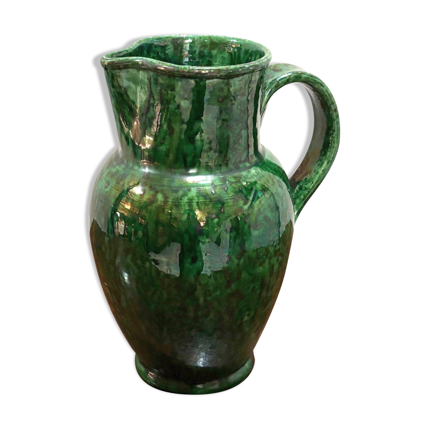 Green glazed ceramic pitcher
