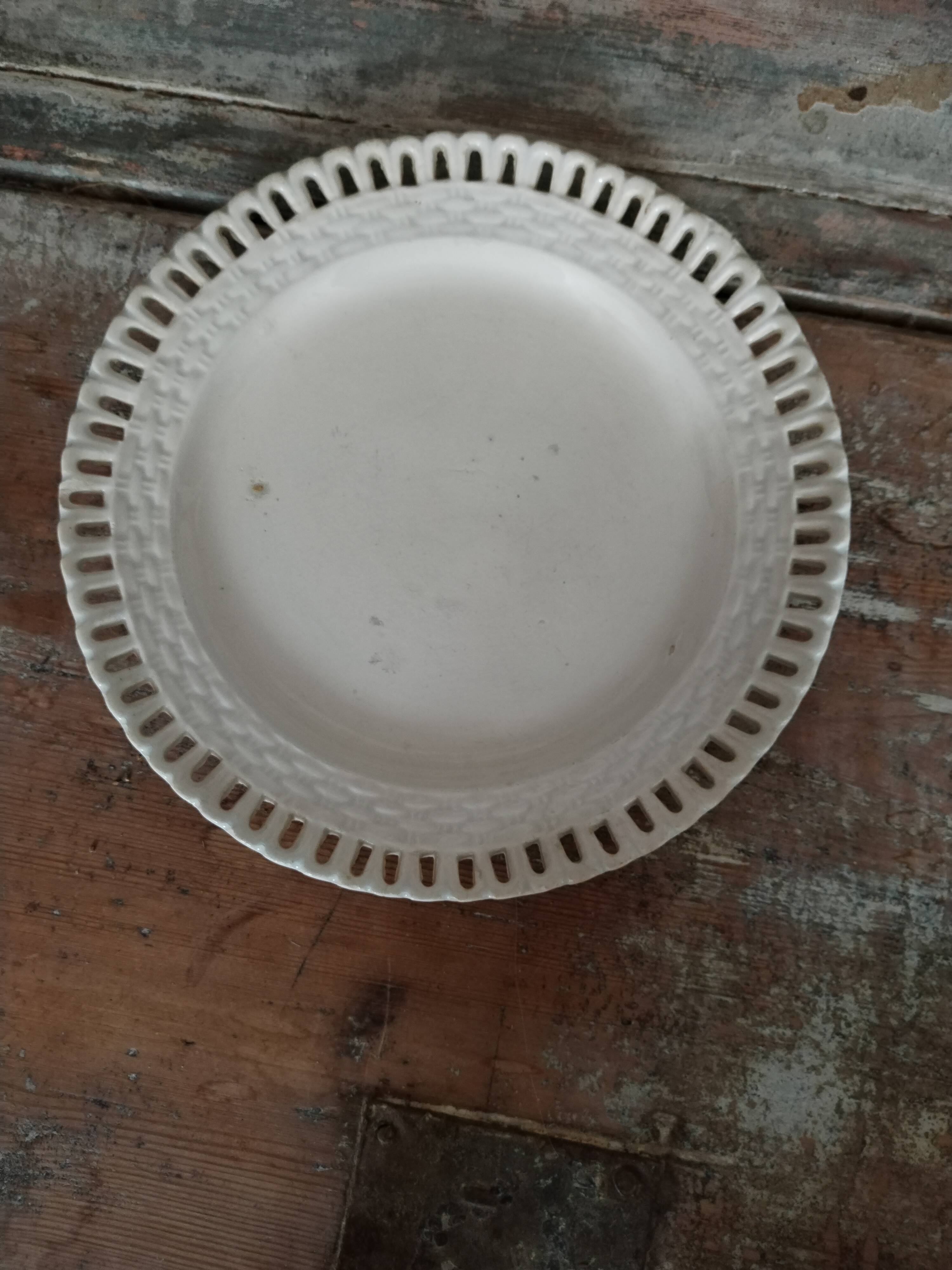 Scalloped white earthenware plate 18th