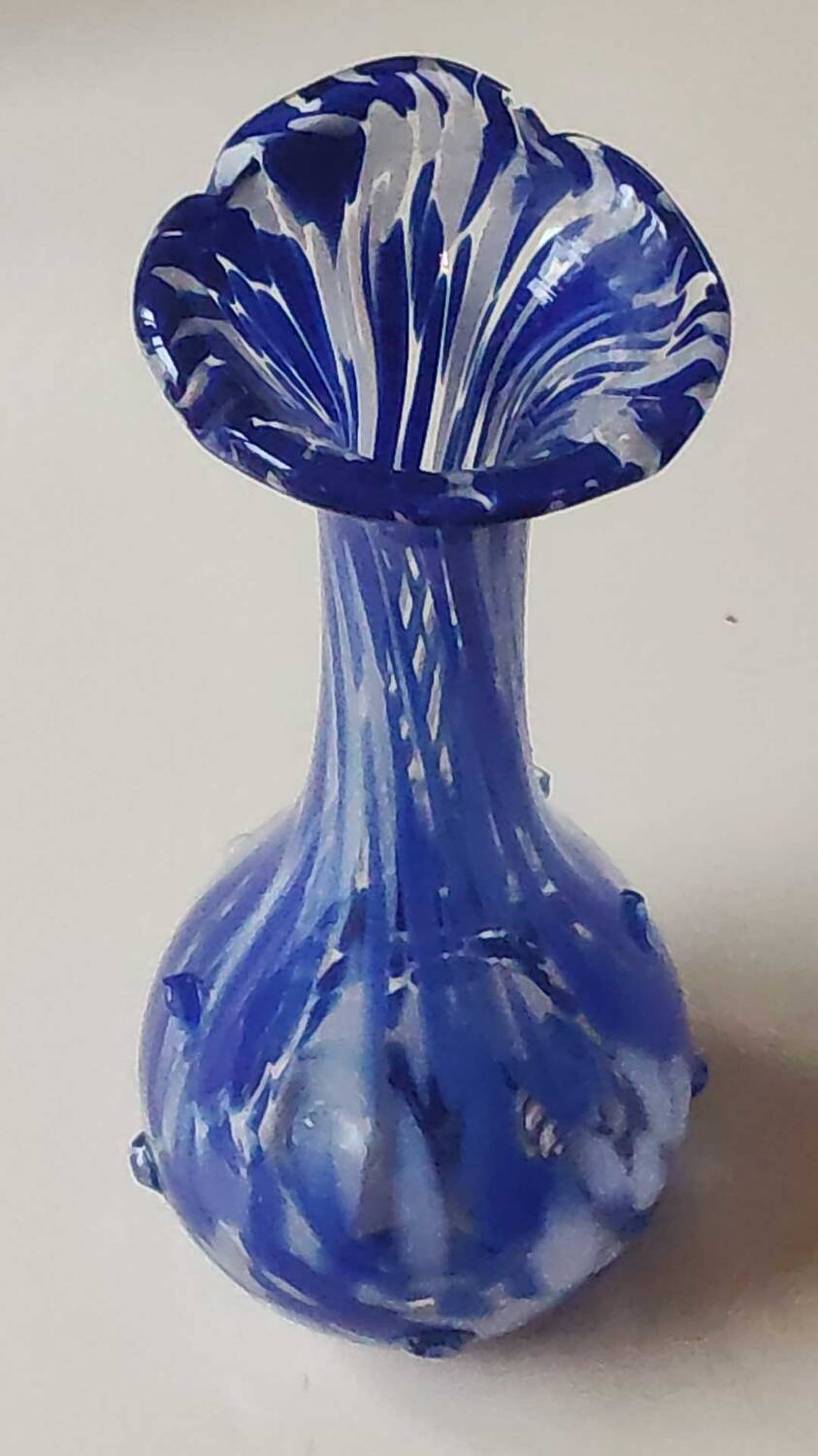 Murano style floral vase. Corolla neck, speckled cobalt blue & white. Dim 24 x 10 cm
