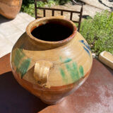 Ancient terracotta pottery jar from the 1920s.