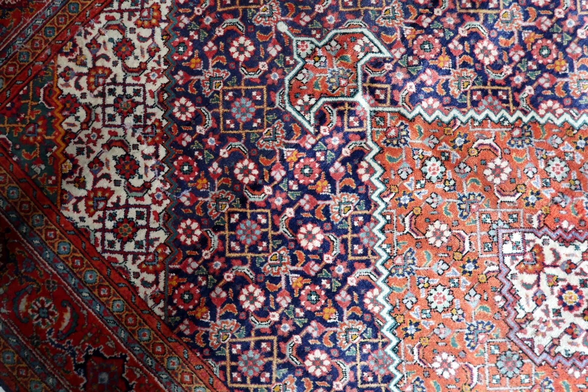 1940s vintage wool medallion rug, red and navy, 206 × 320 cm