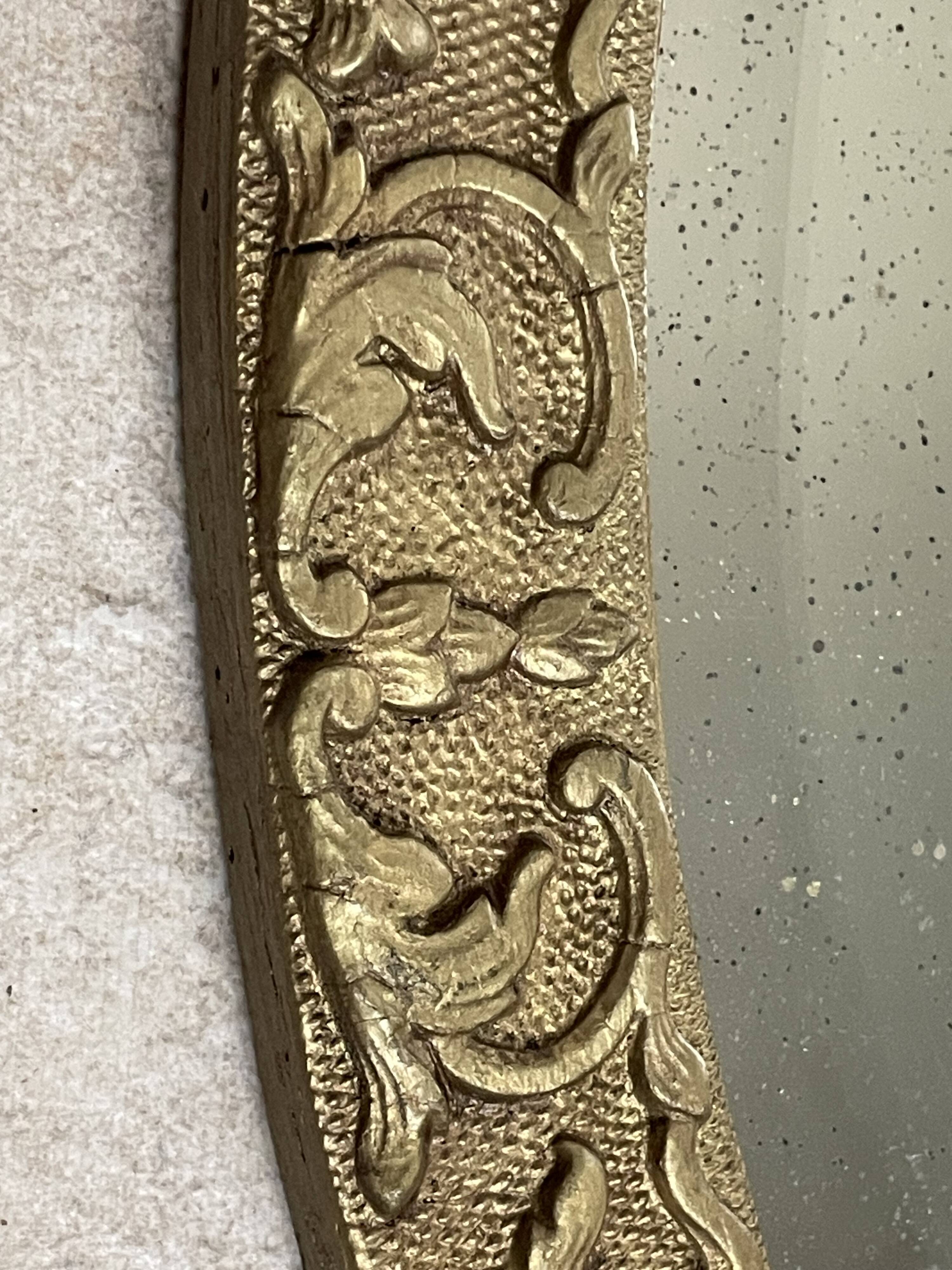 19th century beveled oval mirror