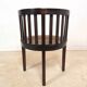 Set of 2 colonial armchairs in wood and cane.