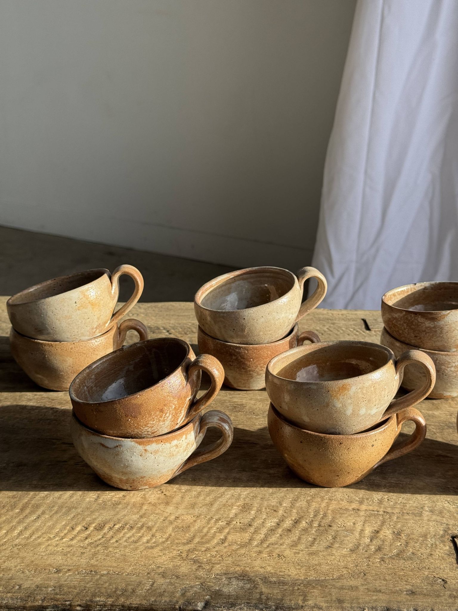 11 tasses à café vintage en grès mat brut