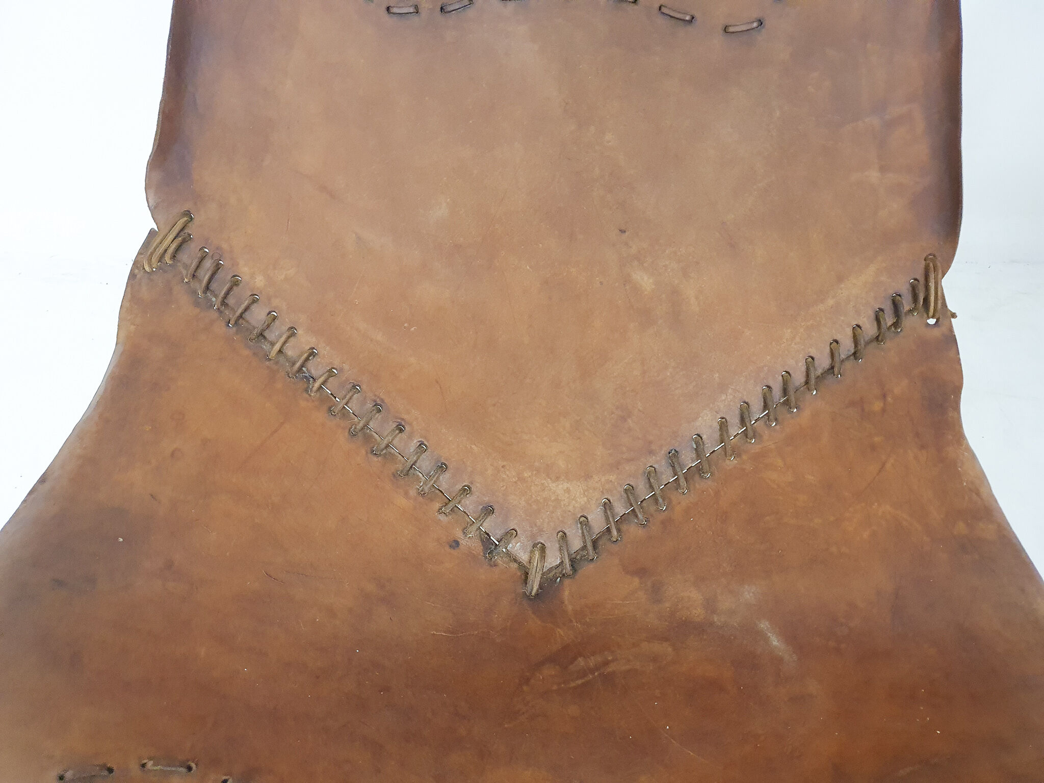 Set of two saddle leather lounge chairs, Brazil, 1960's