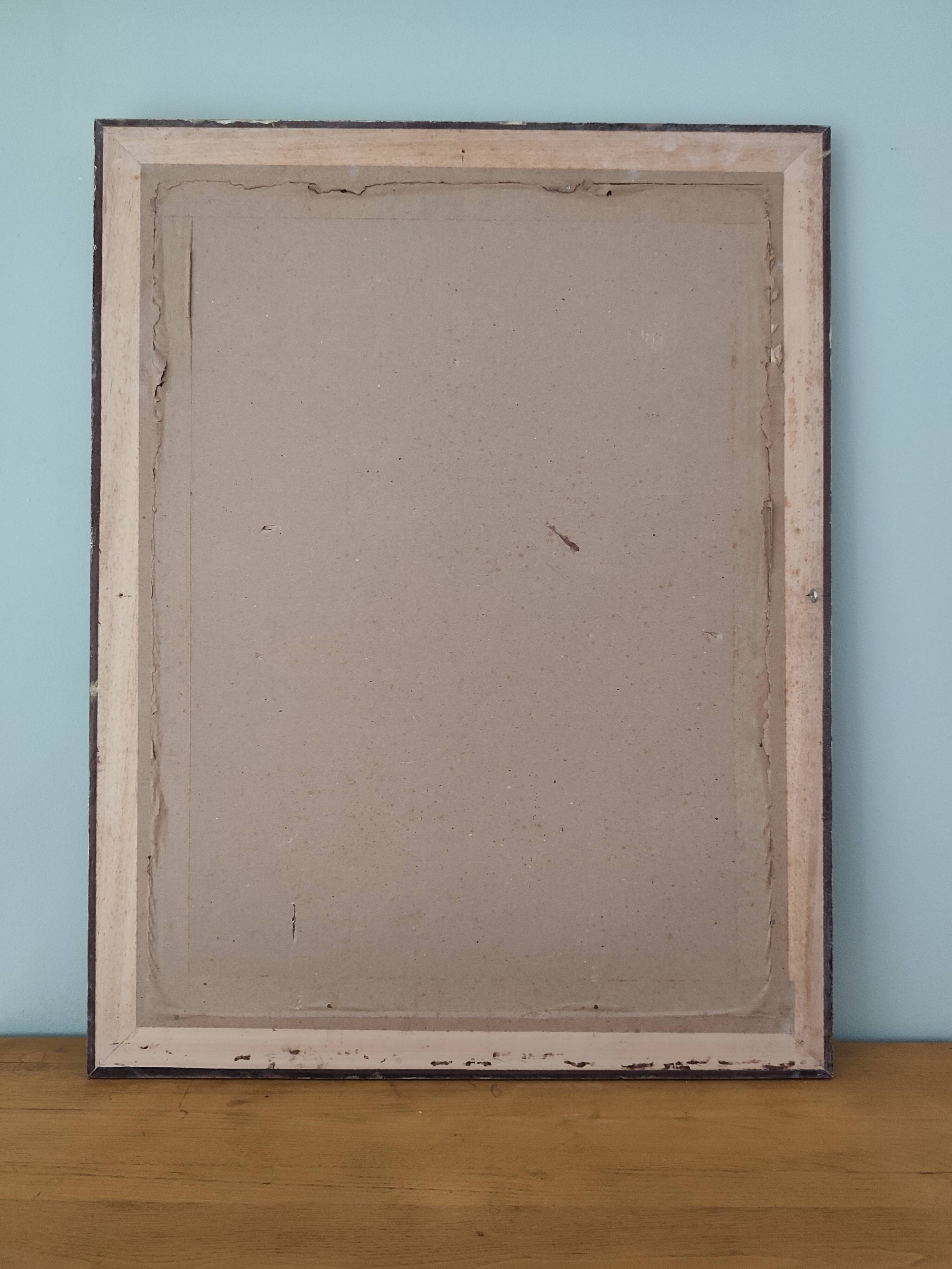 Large gold-framed mirror with bevelled glass.