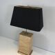 Importante lampe en pierre reconstituée et laiton