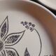 Flat stoneware plates with floral decoration – France – 1970s
