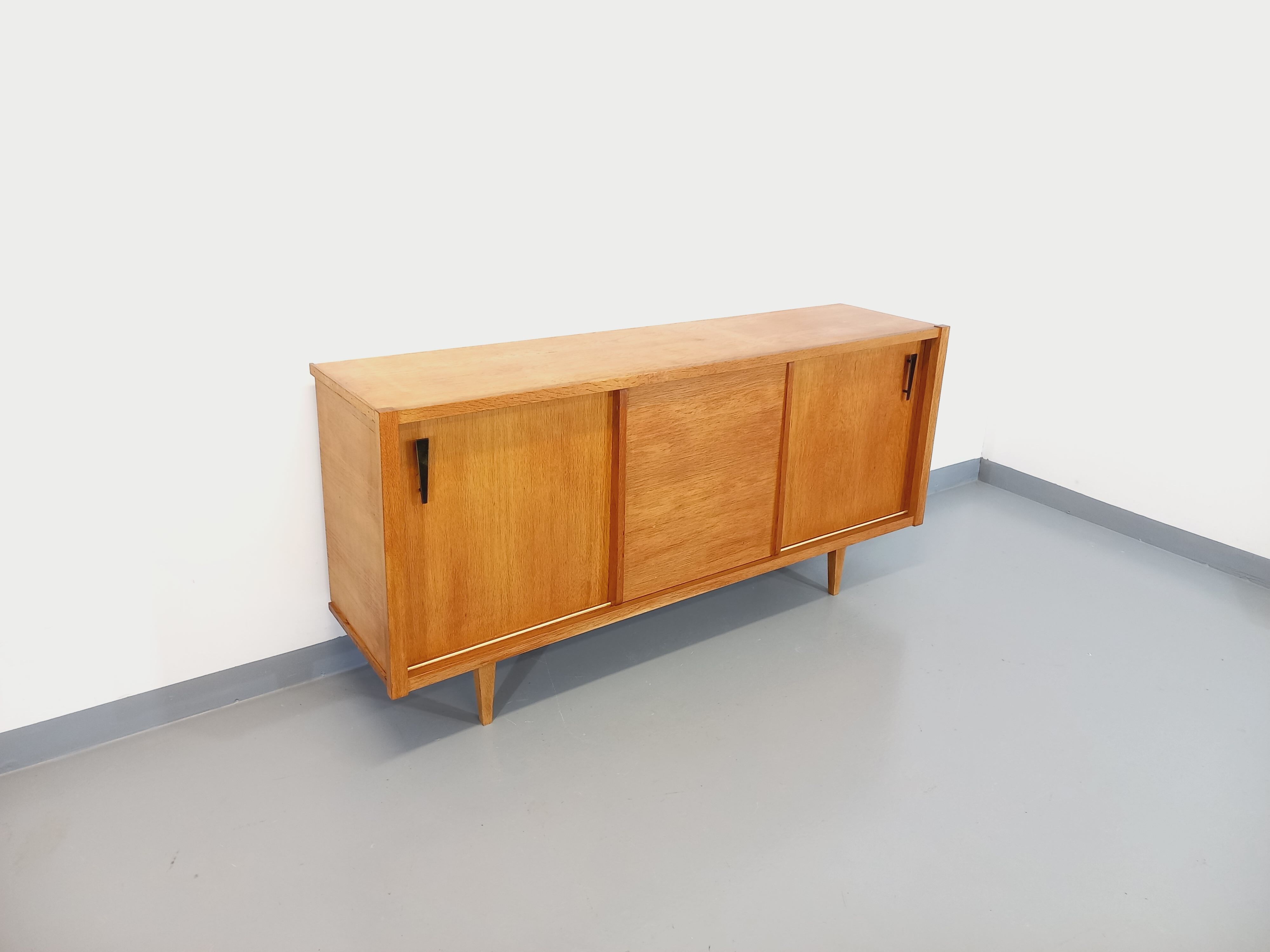 Vintage row in light oak wood from the 60s