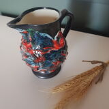 Glazed ceramic pitcher