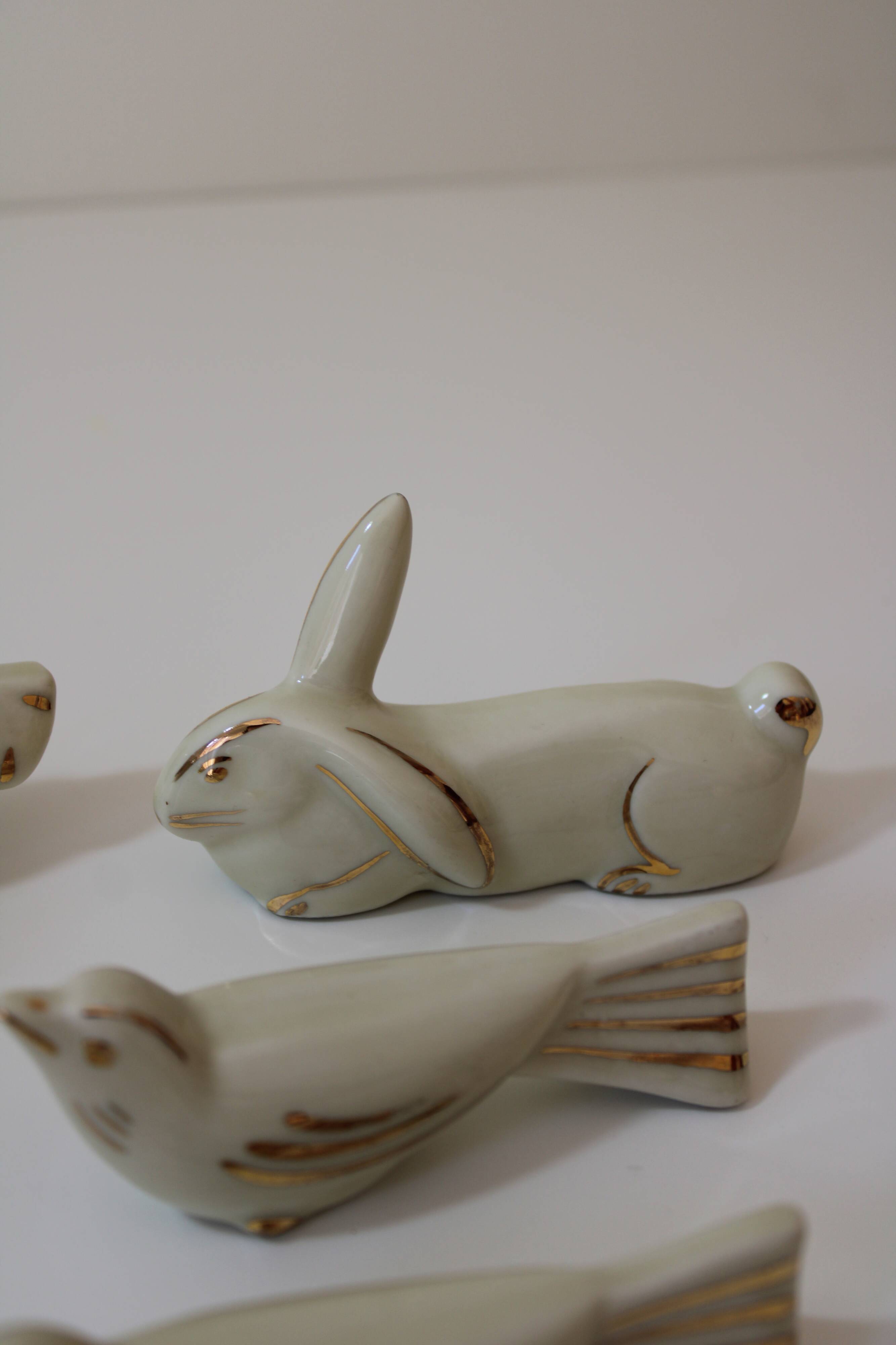 8 portes couteaux animaux porcelaine de Limoges vintage