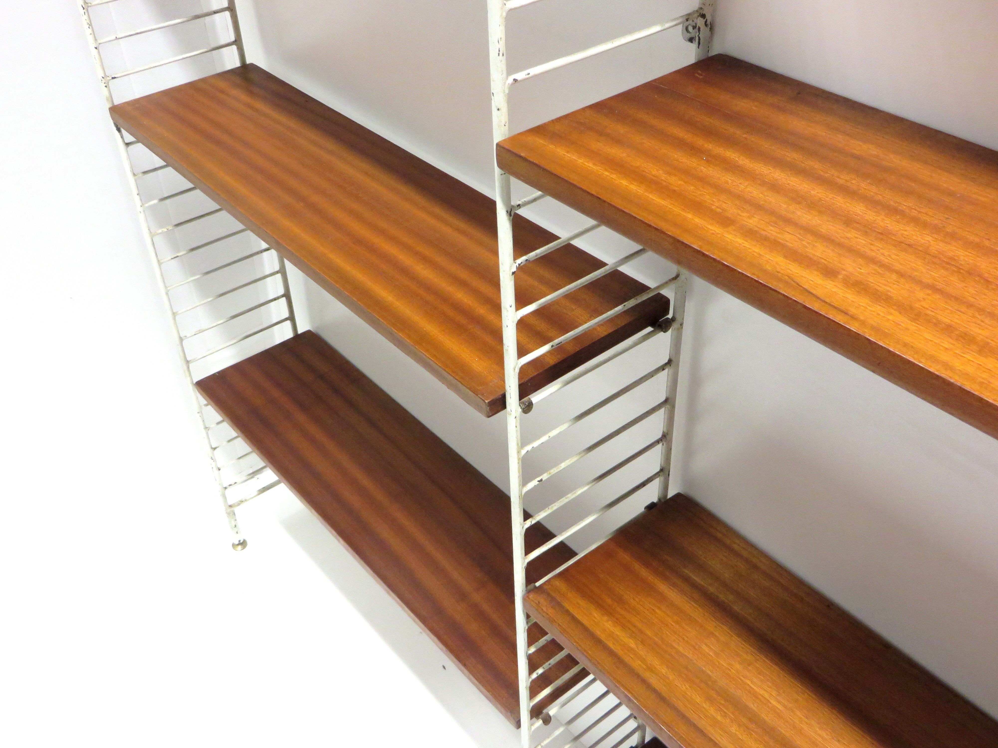 Wall rack with 9 shelves made in the 60