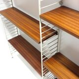 Wall rack with 9 shelves made in the 60