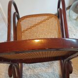 Rocking flesh curved wood and sitting in Art Deco cannage style