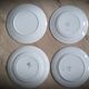 Set 4 green mismatched plates