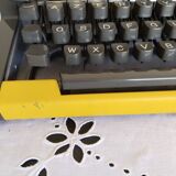 Vintage yellow portable typewriter, working, AEG, new ribbon