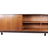 Sideboard in rosewood with sliding doors designed by Omann Junior from the 1960s.