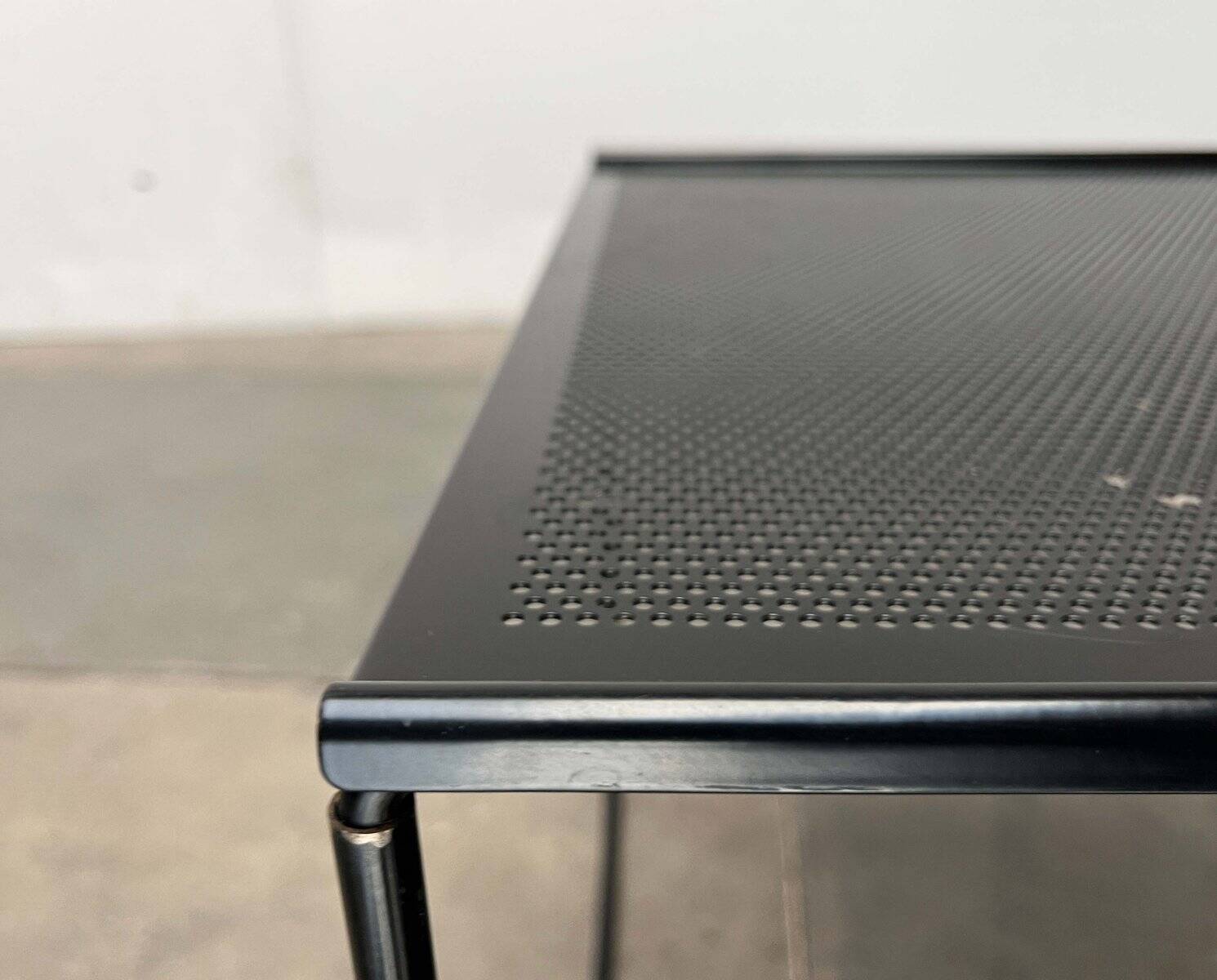 Postmodern perforated metal nesting side table from Ikea, 1980s.