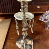 Crystal chandelier and silver-plated metal.