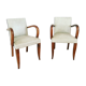 Pair of vintage armchairs in wood and imitation leather