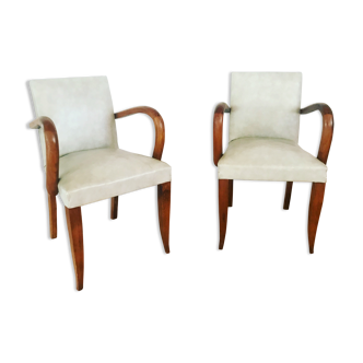 Pair of vintage armchairs in wood and imitation leather
