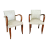 Pair of vintage armchairs in wood and imitation leather
