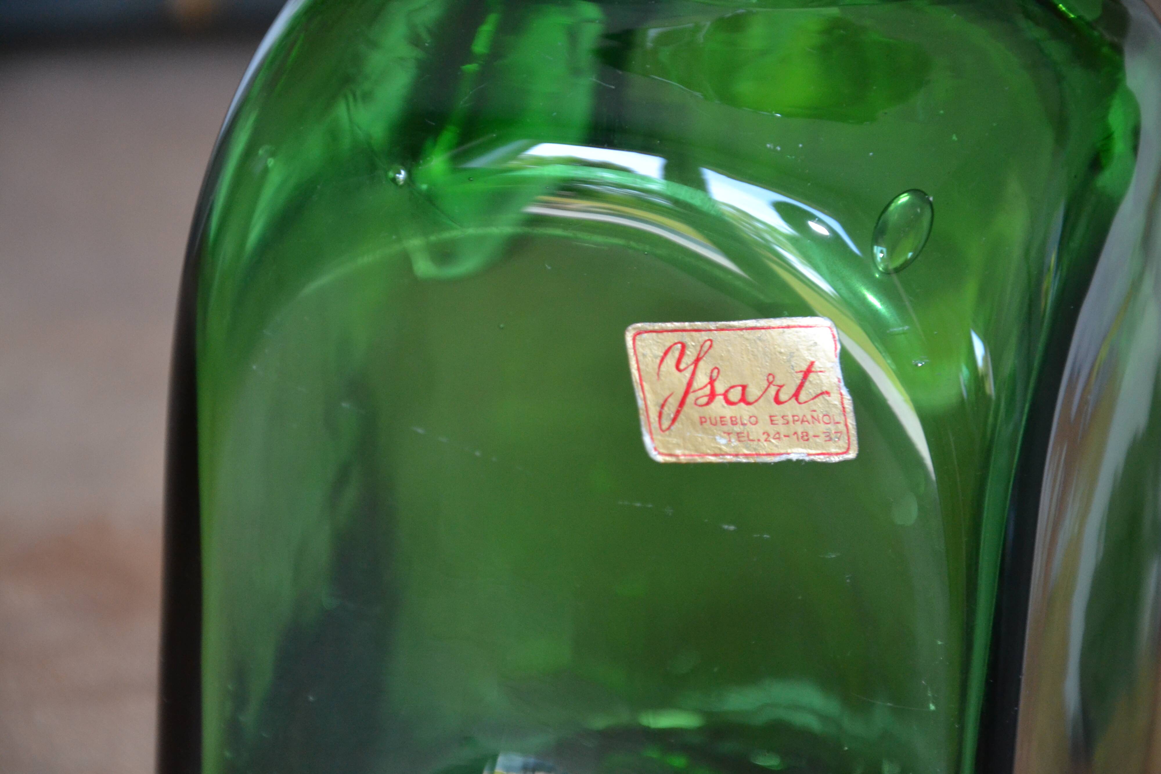 Handcrafted green glass pitcher from Spain