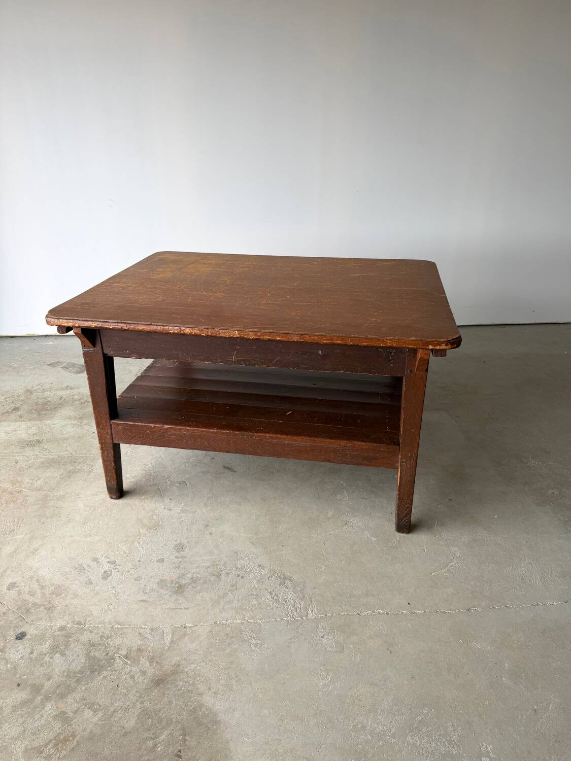 Antique draper's workbench / haberdashery table in solid wood from the early 20th century.