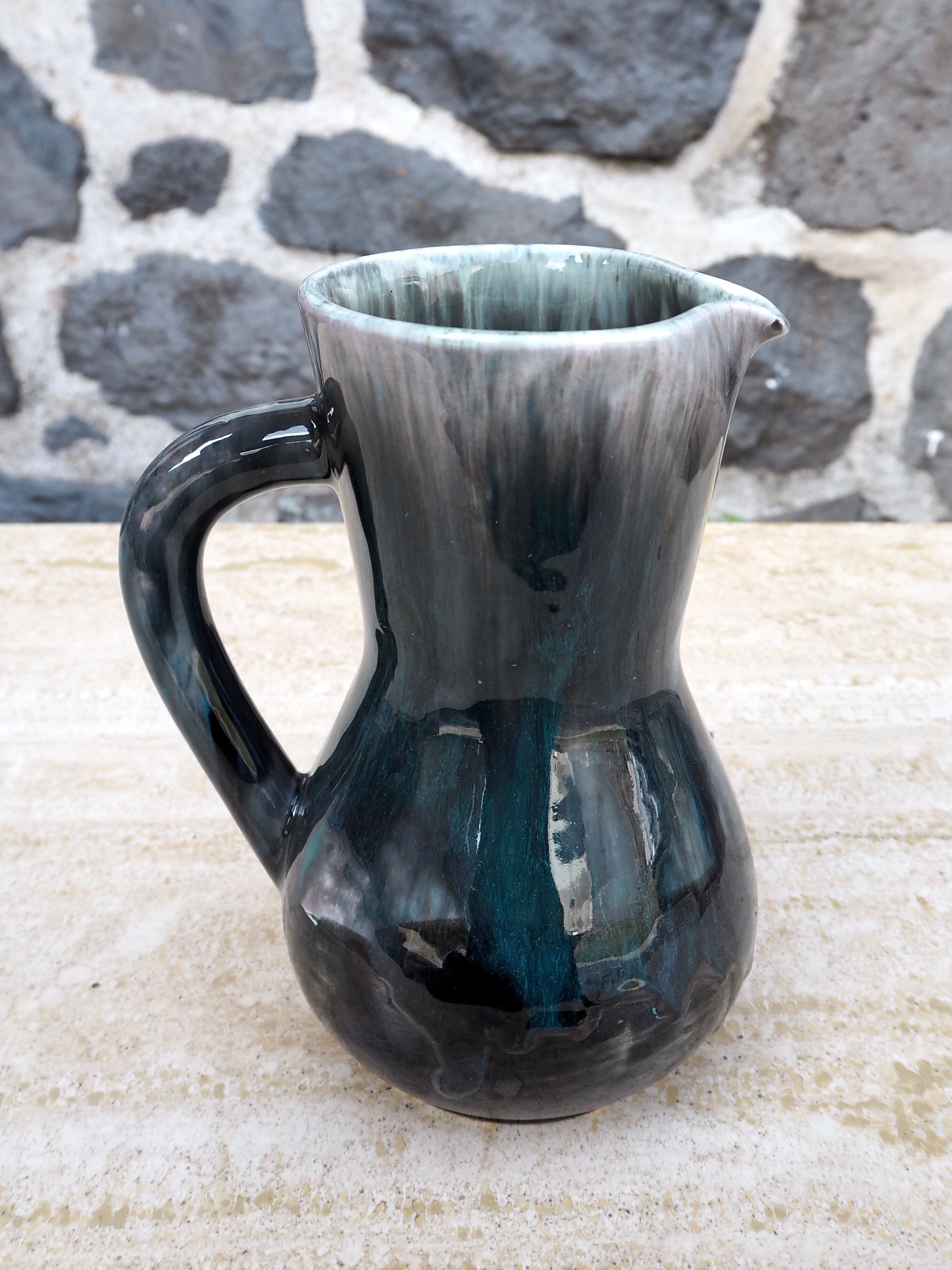 Enamelled ceramic pitcher signed Morvan