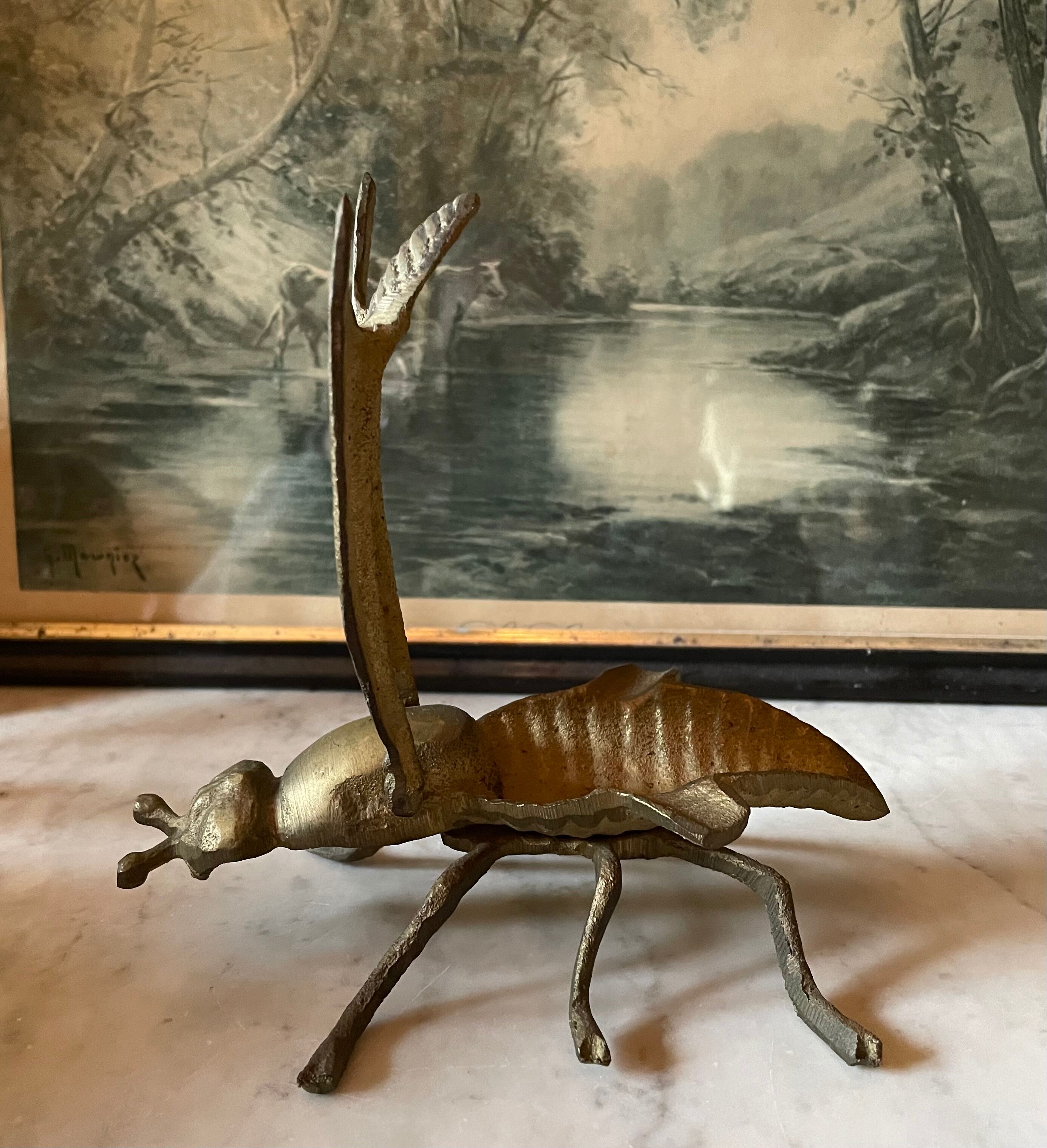 Golden metal insect ashtray