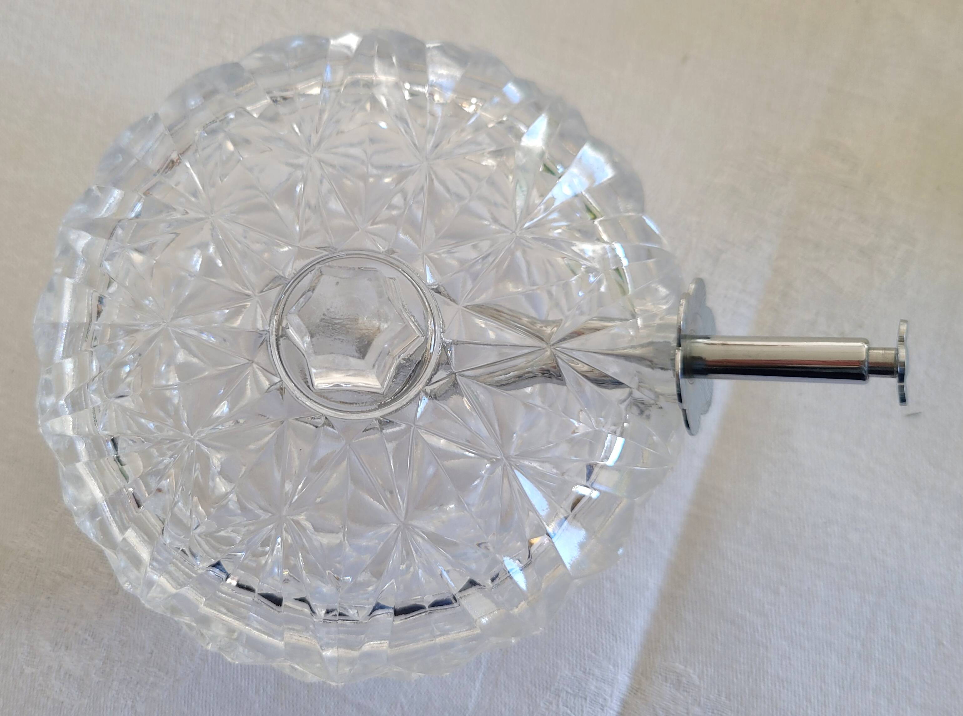 Glass sugar bowl with its tongs