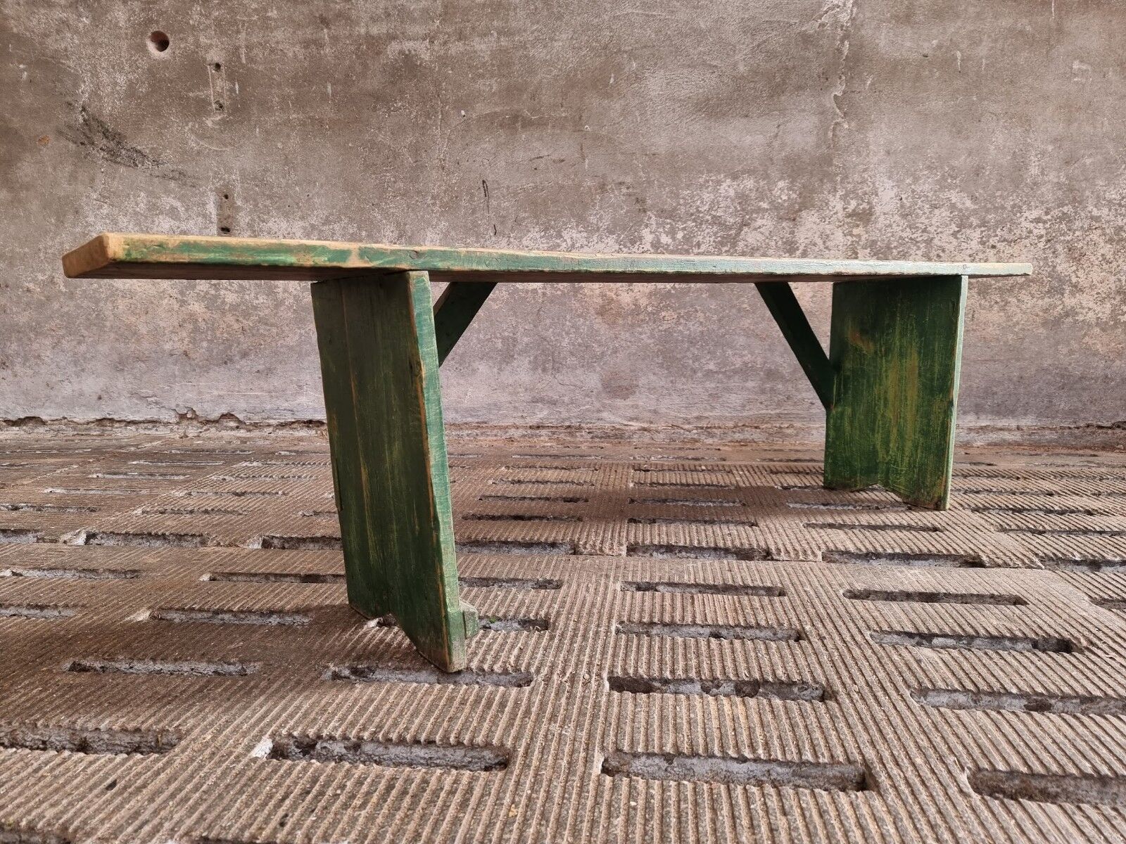 Old wooden bench side table grass green