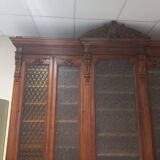 Glass-fronted walnut bookcase