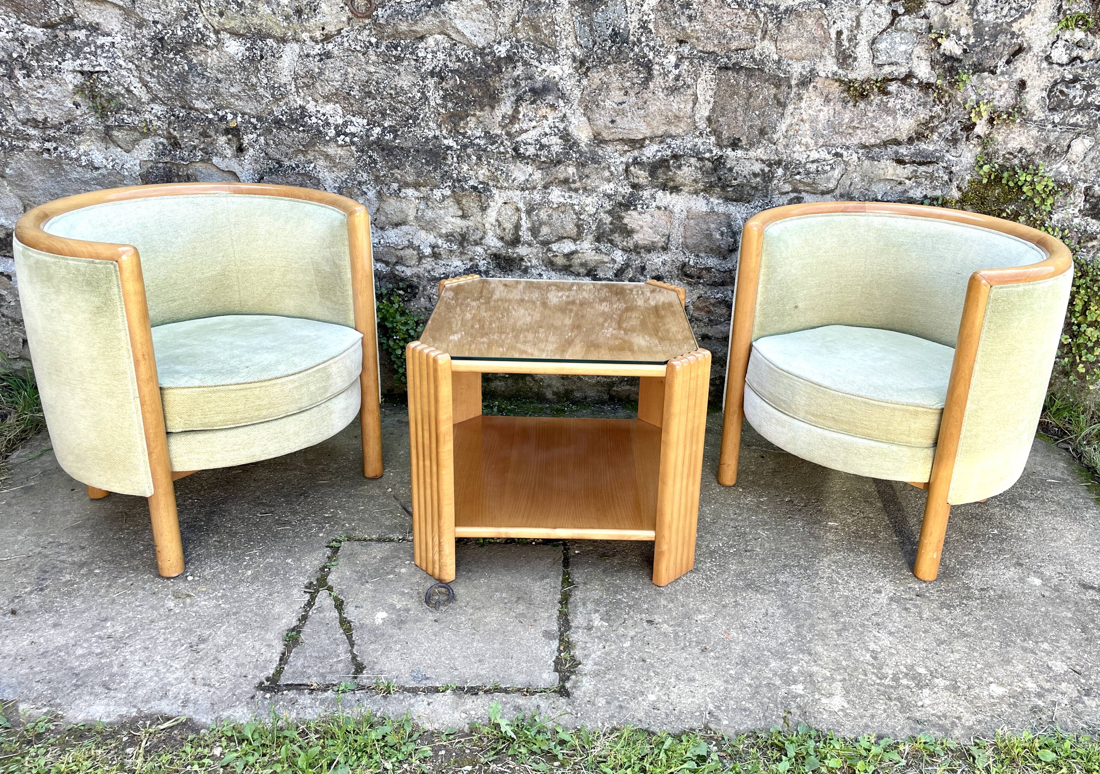 Pair of barrel-shaped armchairs in beech and almond green velvet by Maison Rosello
