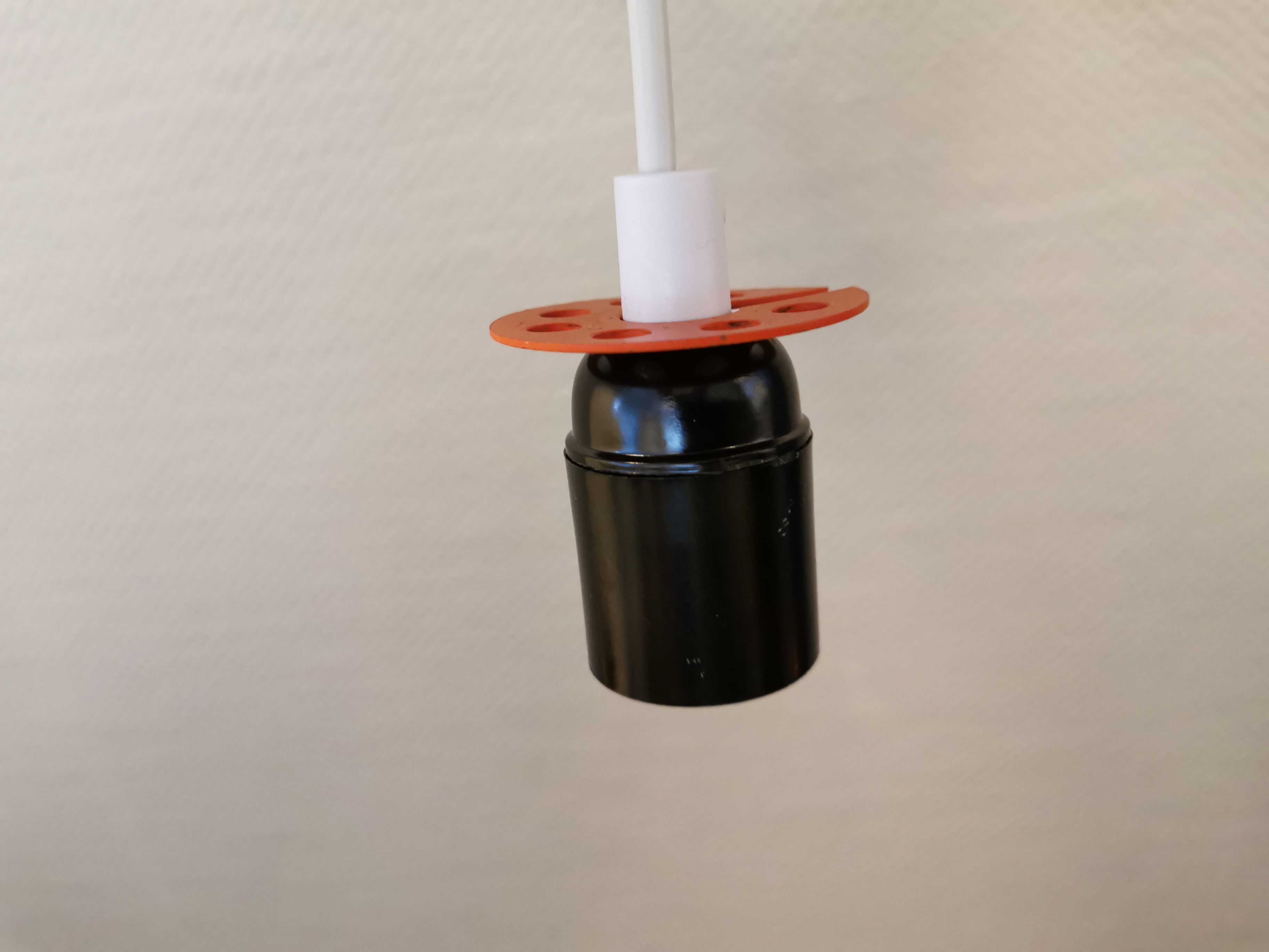 Older ph 4/3 hanging lamp, in white, with original orange suspension disk.