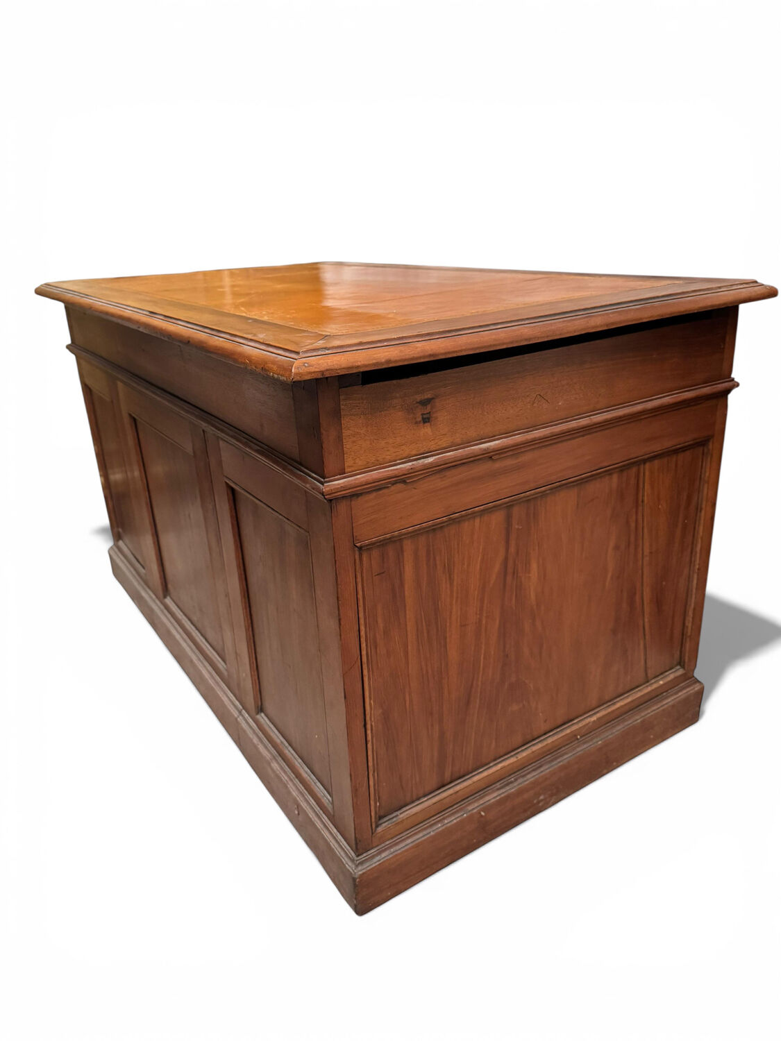 Oak desk with 9 drawers and leather writing pad.