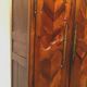Armoire Louis XV a chapeau de gendarme en merisier massif XVIII siècle