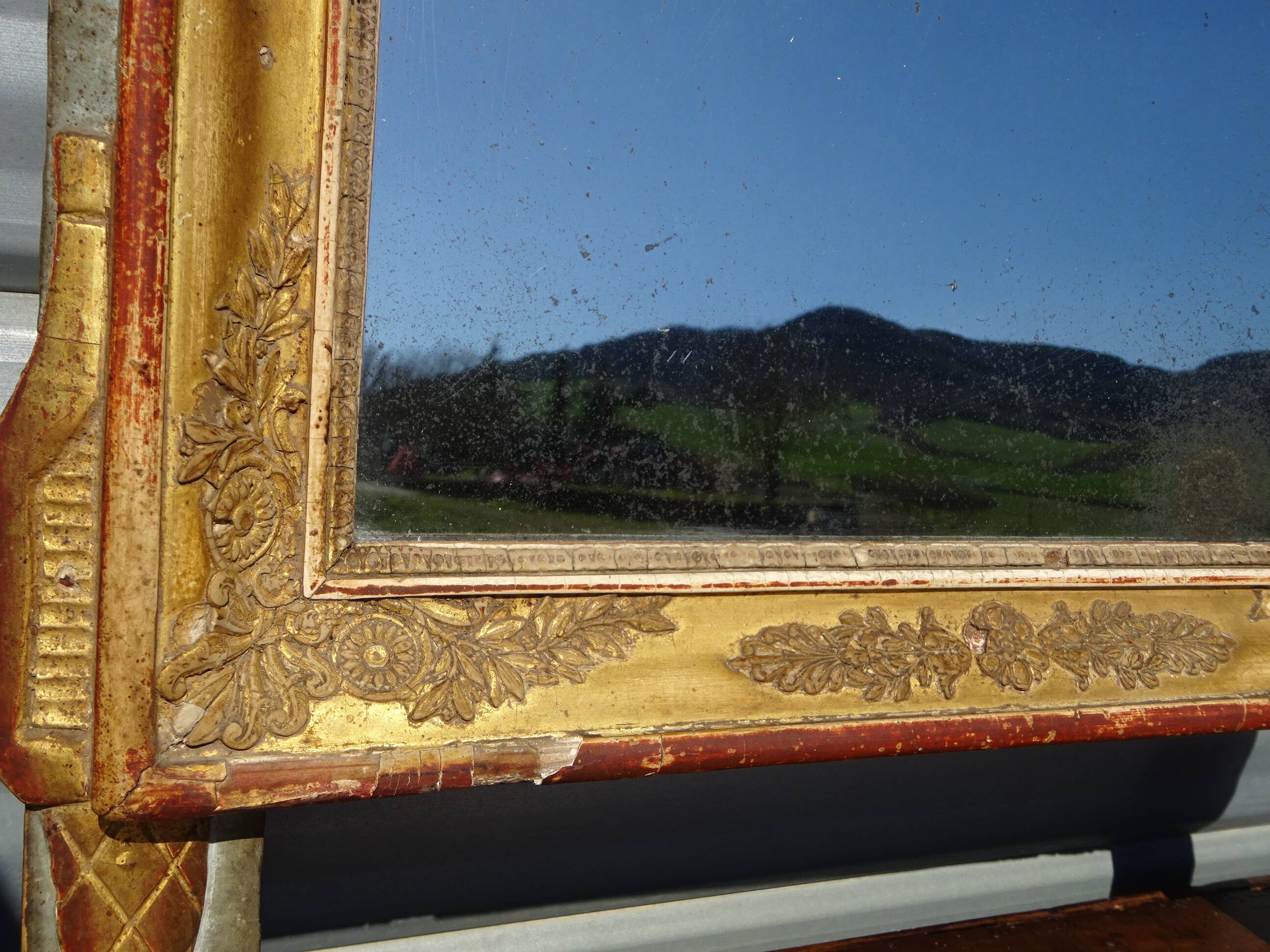 Very old Louis XVI style mirror.